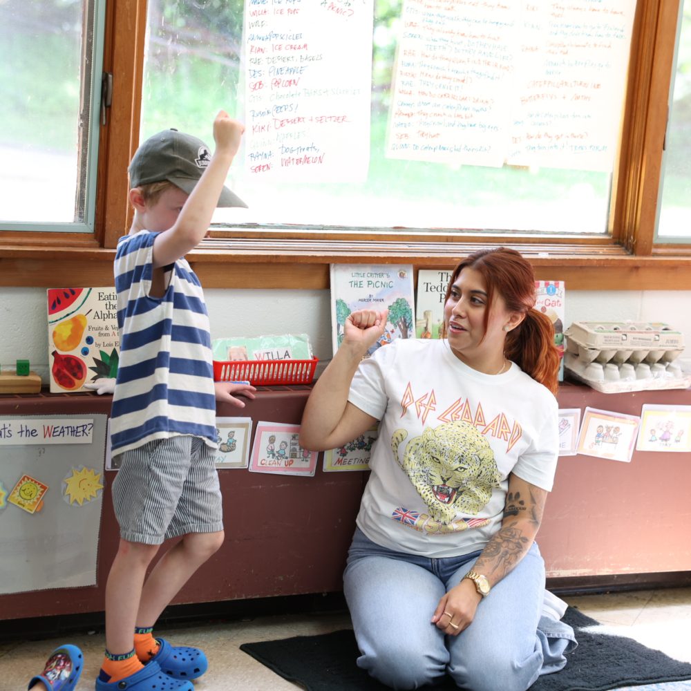 Teacher and pupil playing together